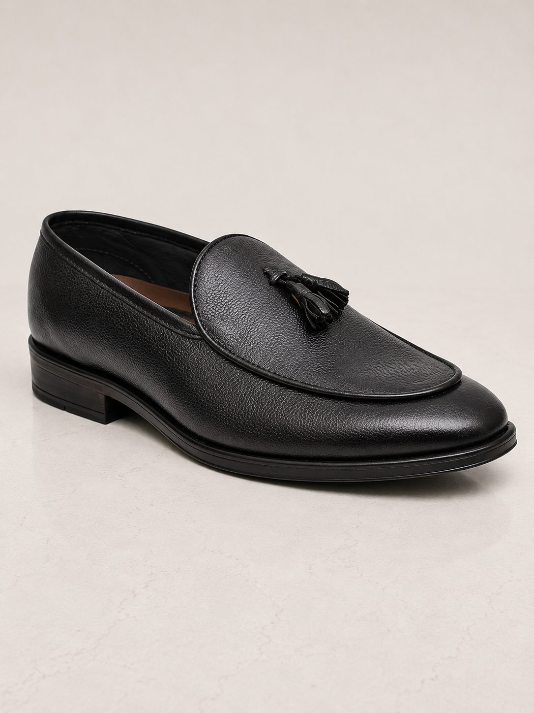 amisar black thermoplastic rubber slip on cemented full grain leather classic tassel loafer side view